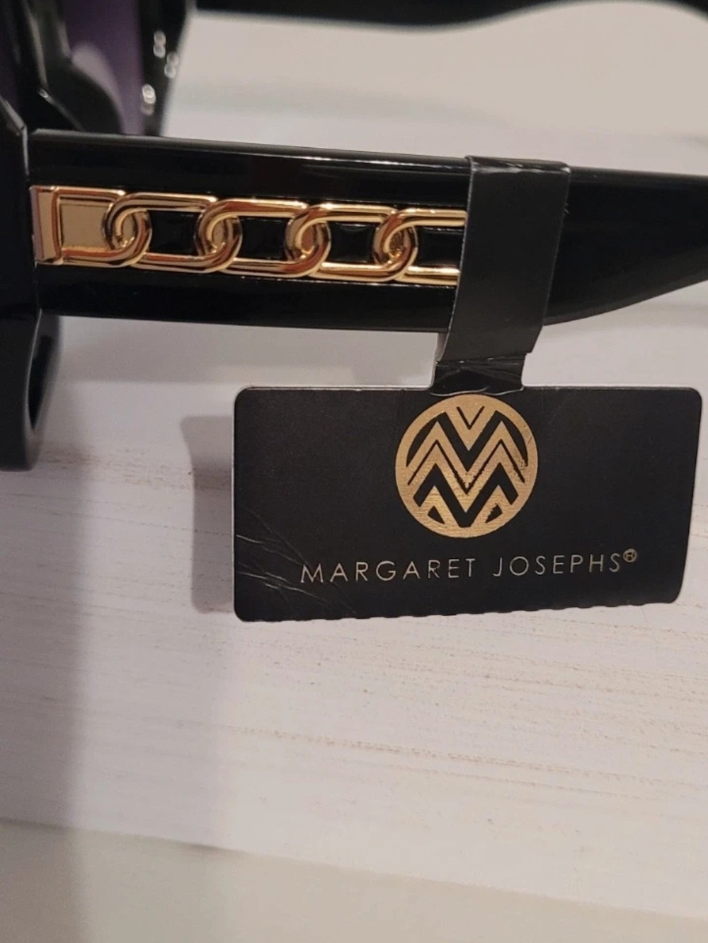 Black Sunglasses with Gold Chain Accent